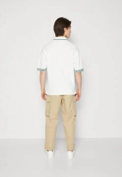 Marc O'Polo DENIM SHORT SLEEVE BUTTON PLACKET TIPPING WORDING CUFF - Poloshirt - Egg White 8 Marc O'Polo DENIM SHORT SLEEVE BUTTON PLACKET TIPPING WORDING CUFF - Poloshirt - Egg White -Mode Familie fc9aa0d0139d41188b144fddc434b758